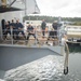 Sailors Heave Around A Line
