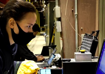 CRREL research general engineer Kathryn Trubac starts the wave tank