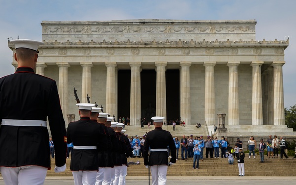 Barracks Marines present “three-round volley” and “Taps” for Honor Flight Network