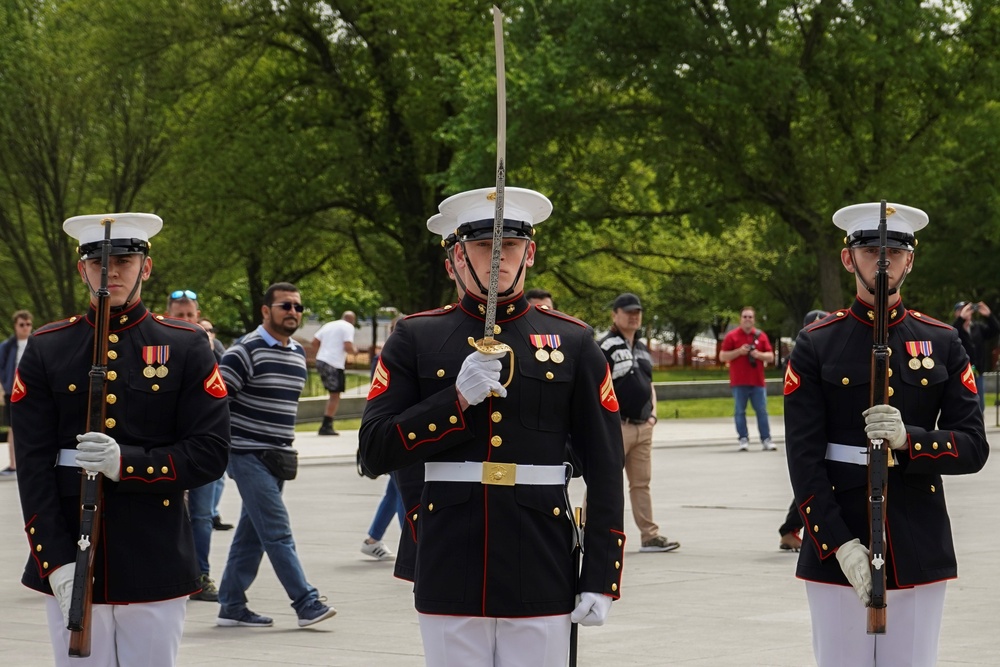 Barracks Marines present “three-round volley” and “Taps” for Honor Flight Network