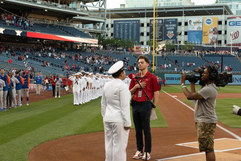 Musician First Class Danlie Cuenca sings the &quot;Star Spangled Banner&quot; for Navy Day at Nationals Park