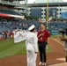 Musician First Class Danlie Cuenca sings the &quot;Star Spangled Banner&quot; for Navy Day at Nationals Park