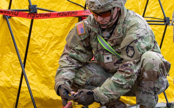 CBRN Specialist sets up decontamination line