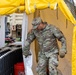 Engaged Squad Leader Conducts Inspections of Decontamination Line