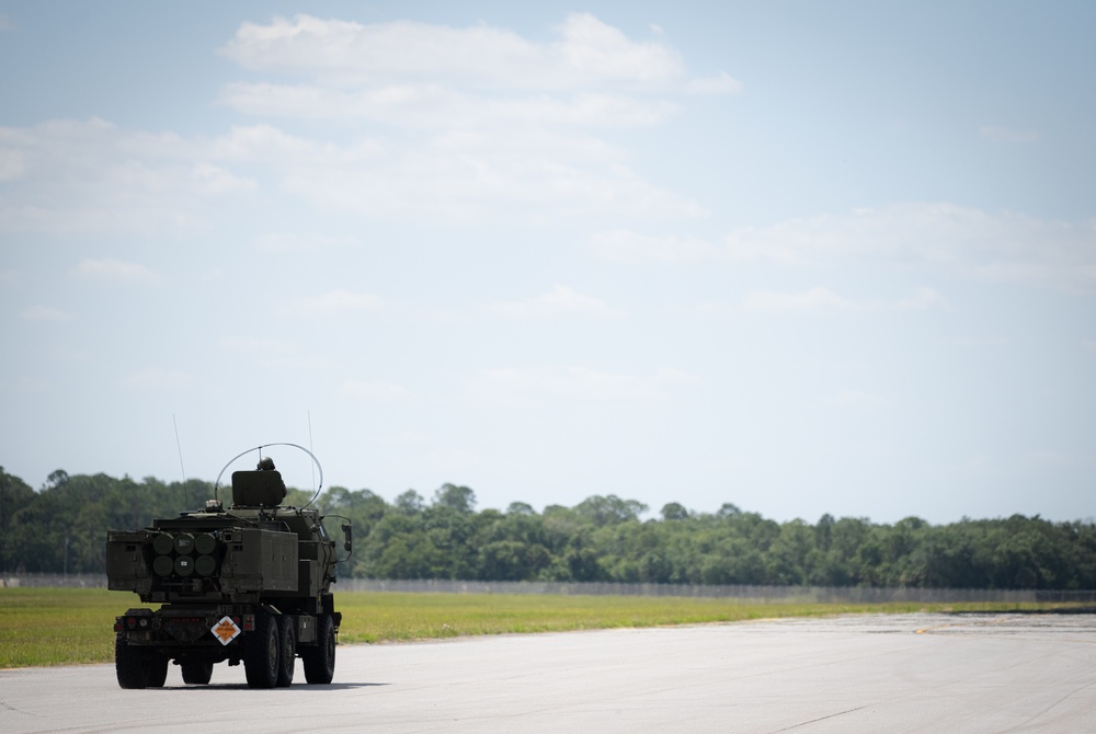 U.S. Marine Corps launch High Mobility Artillery Rocket System during Emerald Warrior 22.1