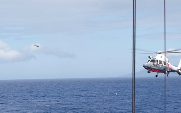 French Navy Helicopters Touchdown on the USS Pearl Harbor