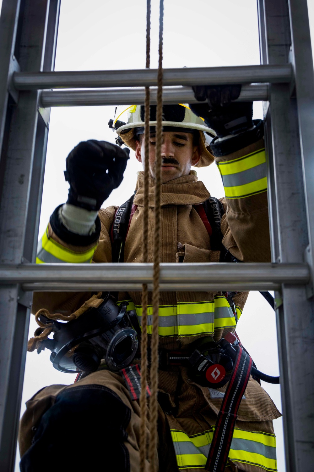 Military firefighters conduct the Physical Abilities Test