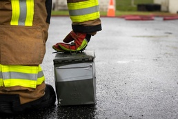 Military firefighters conduct the Physical Abilities Test