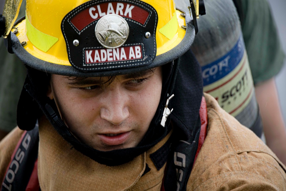 Military firefighters conduct the Physical Abilities Test