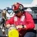 Abraham Lincoln Sailors load ordnance