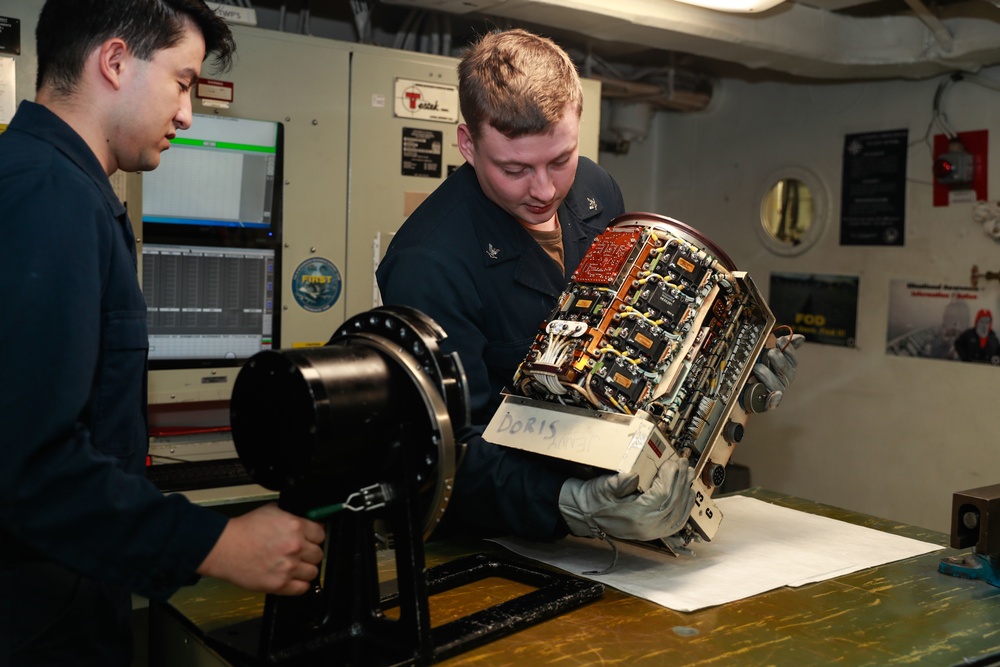 Abraham Lincoln Sailors conduct aviation maintenance