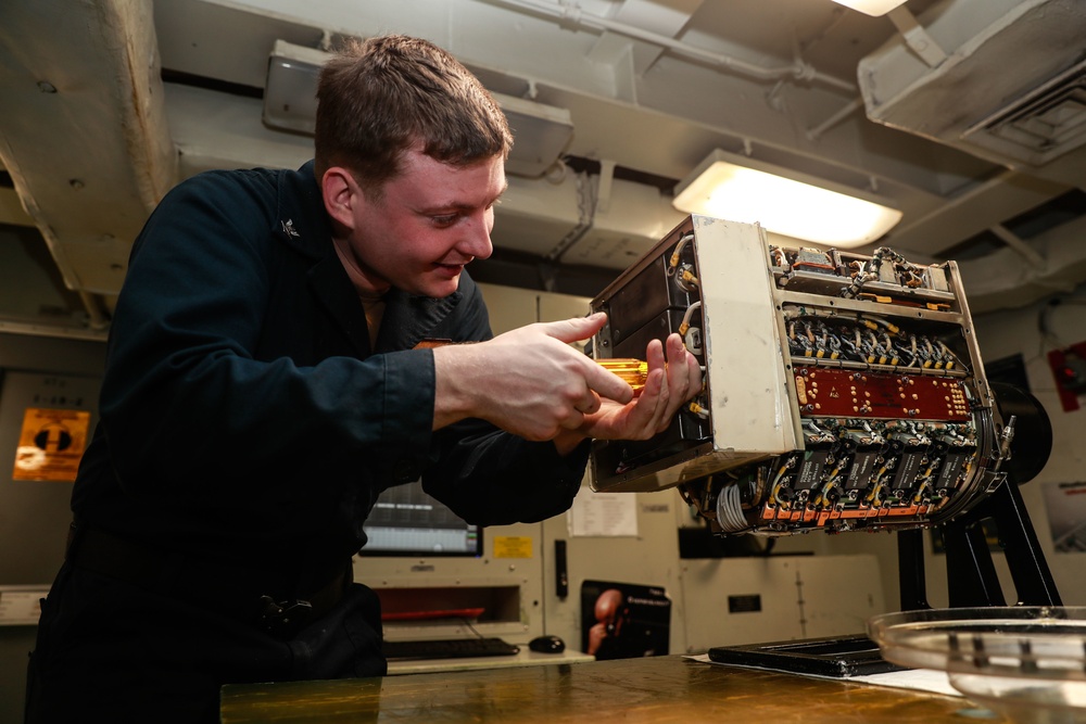 Abraham Lincoln Sailors conduct aviation maintenance