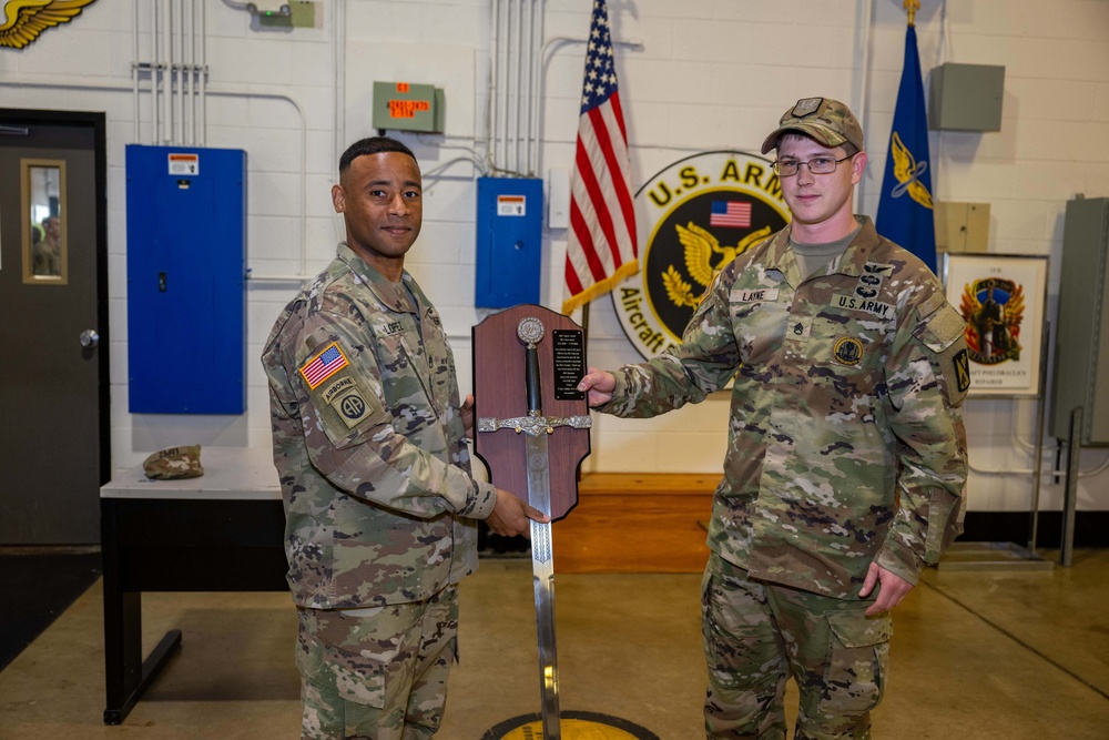 Staff Sgt. Israel Lopez PCS sword and plaque presentation.