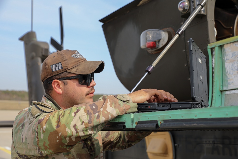 Armament, Electrical, Avionic Systems Repairers Prepare Apache's for Gunnery