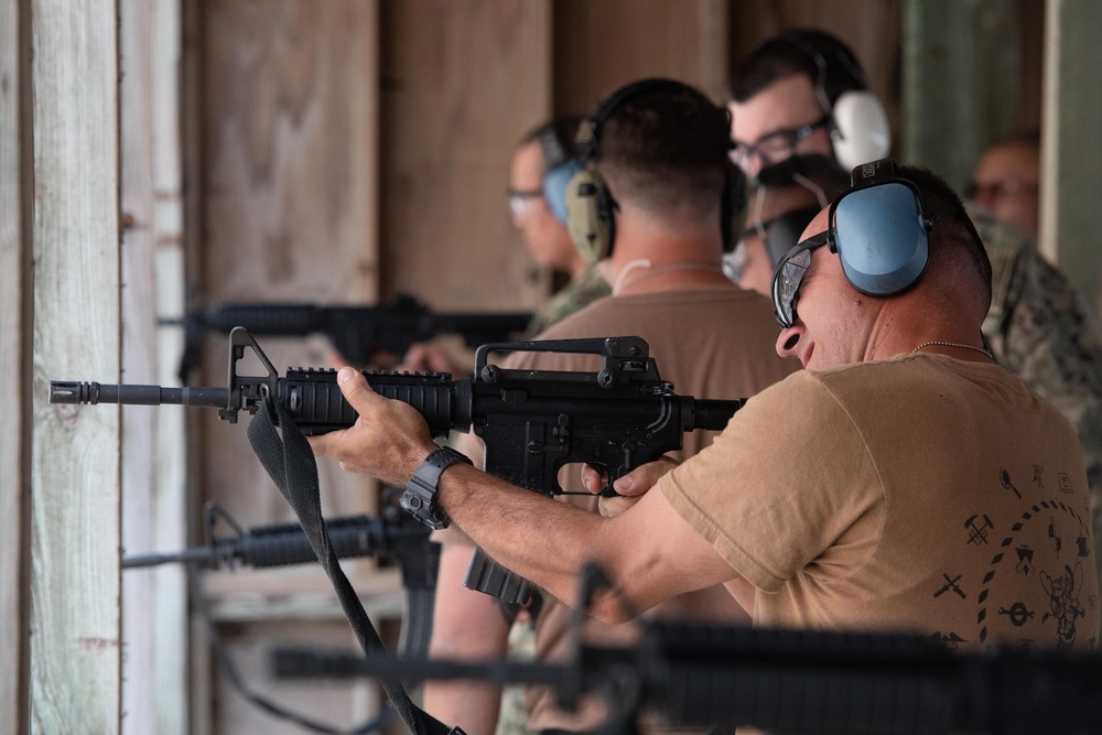 NMCB-14 qualifies members in the M-18 pistol and M-4 rifle small arms platforms.