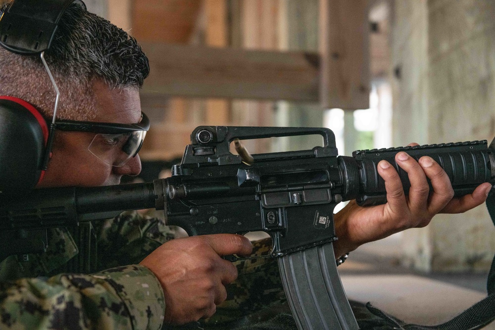 NMCB-14 qualifies members in the M-18 pistol and M-4 rifle small arms platforms.