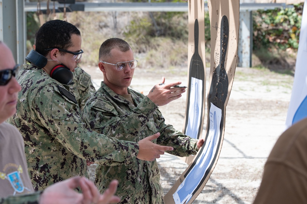 NMCB-14 qualifies members in the M-18 pistol and M-4 rifle small arms platforms.