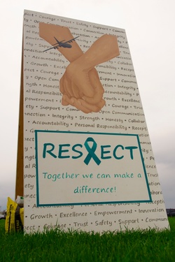 Art of gold: 934 AW SARC creates mural for Sexual Assault Awareness Month