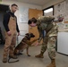 Ophthalmologist screens 673d Security Forces Squadron military working dogs