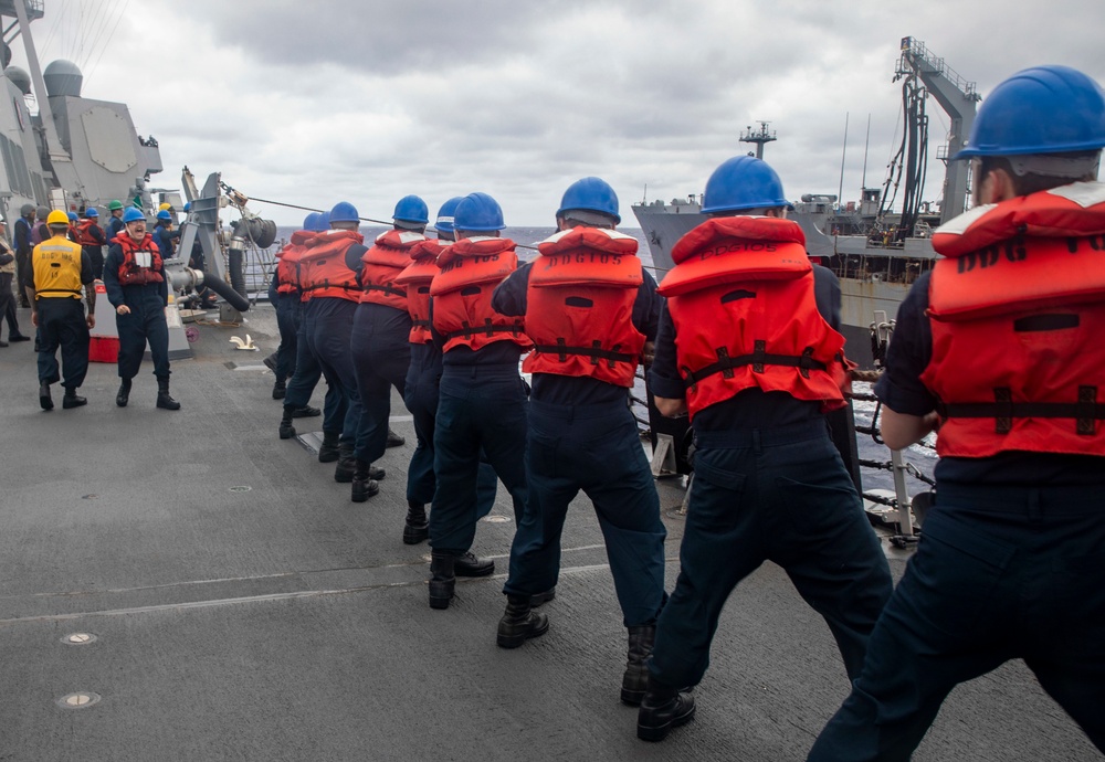 Sailors Aboard USS Dewey (DDG 105) Conduct Replenishment-at-Sea with USNS Tippecanoe (T-AO-199)