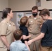 Master Chief Musician Adam Grimm, Navy Band Public Affairs Officer, is pinned to E9