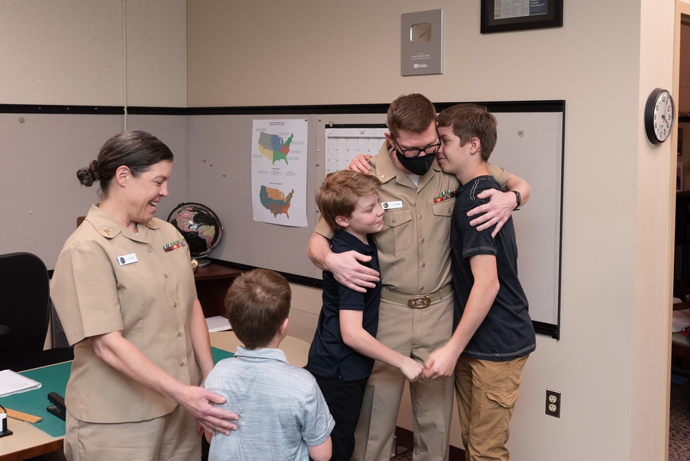 Master Chief Musician Adam Grimm, Navy Band Public Affairs Officer, is pinned to E9