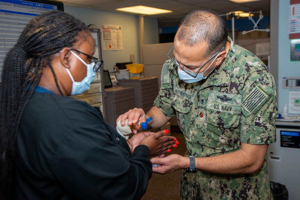 NMCP CHAPLAINS PERFORM BLESSING OF THE HANDS