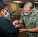NMCP CHAPLAINS PERFORM BLESSING OF THE HANDS