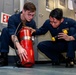 Abraham Lincoln Sailors conduct maintenance