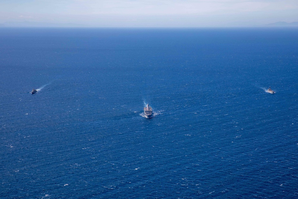 U.S. and Greek (Hellenic) naval ships sail in formation