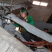 Abraham Lincoln Sailors conduct aircraft maintenance