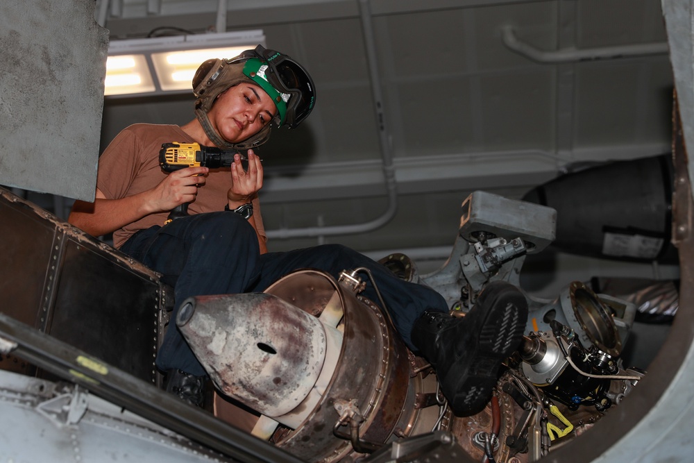 Abraham Lincoln Sailors conduct aircraft maintenance