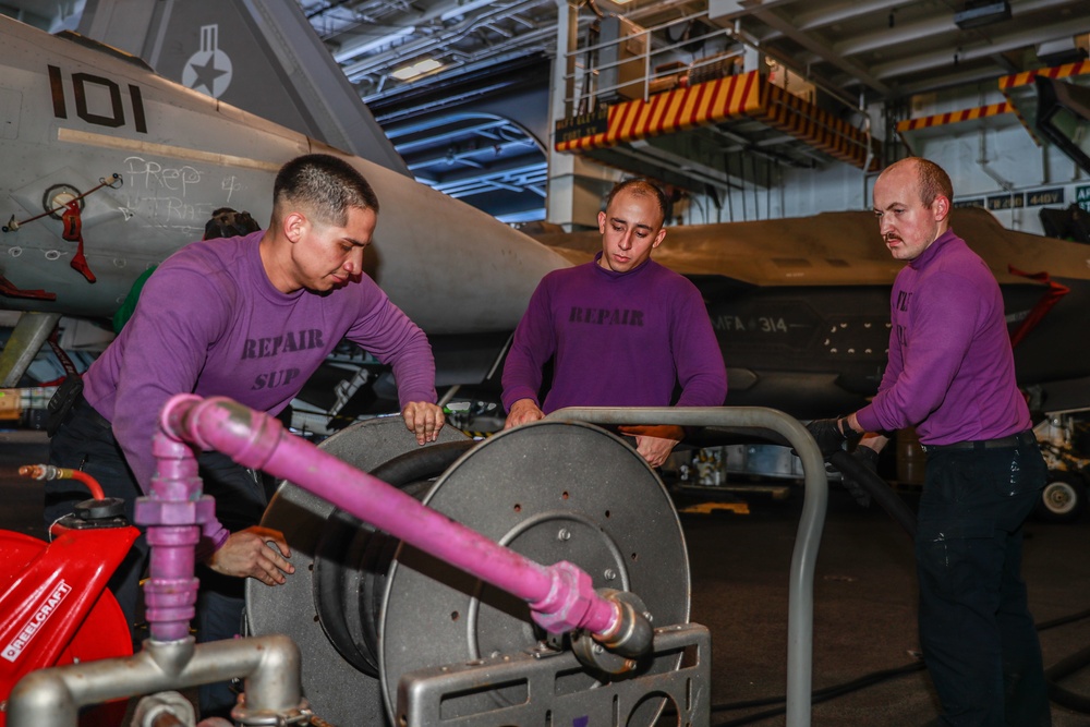 Abraham Lincoln Sailors conduct maintenance