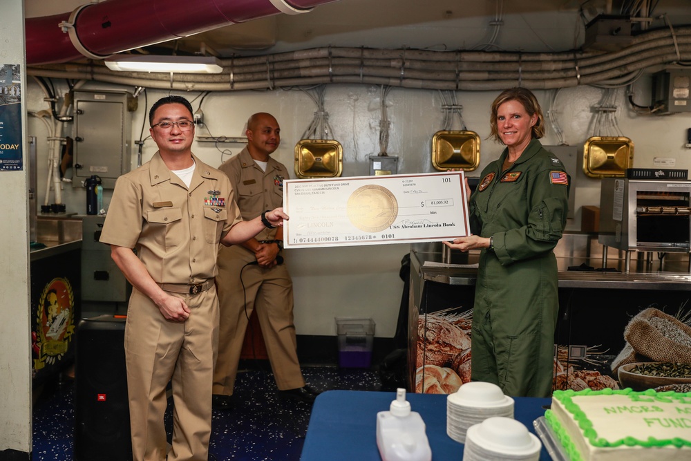 Abraham Lincoln Sailors present check