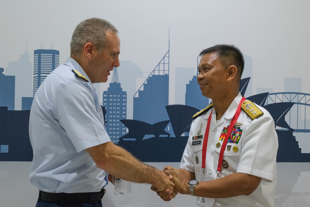 U.S. Coast Guard Pacific Area Commander and Command Master Chief explore commonality and purpose with other nations at the Indo Pacific 2022 conference