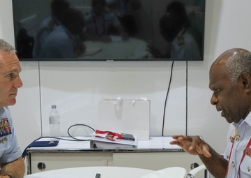 U.S. Coast Guard Pacific Area Commander and Command Master Chief explore commonality and purpose with other nations at the Indo Pacific 2022 conference