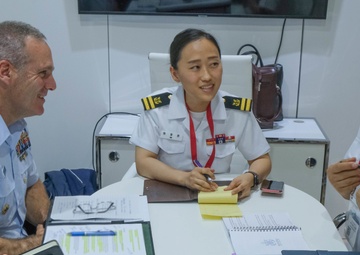 U.S. Coast Guard Pacific Area Commander and Command Master Chief explore commonality and purpose with other nations at the Indo Pacific 2022 conference