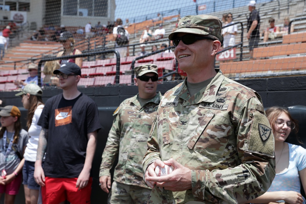 110th Aviation Brigade Commander throws ceremonial 1st pitch