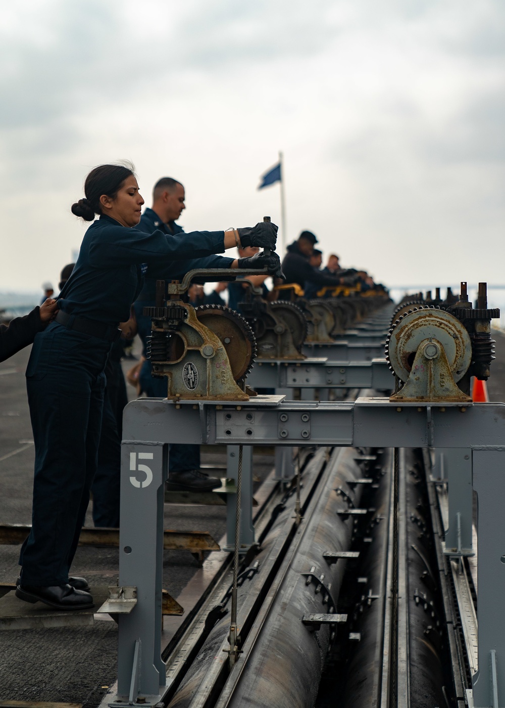 USS Carl Vinson (CVN70) Sailors Remove Aircraft Catapult