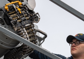 USS Milius loads weapons systems