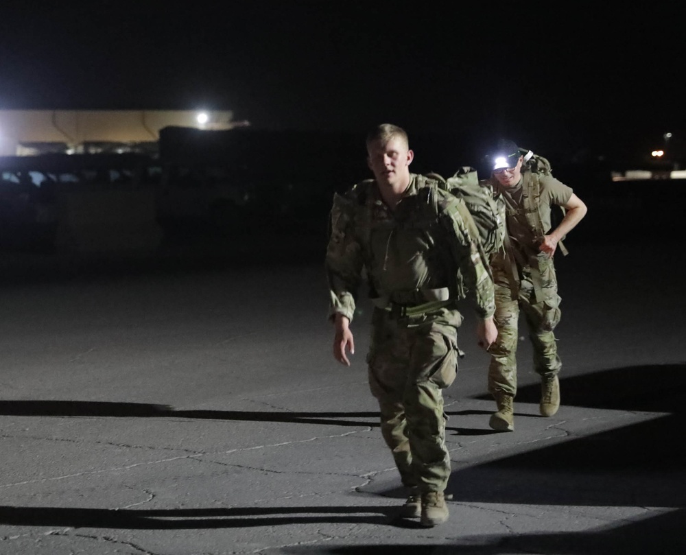 U.S. Soldiers and Coalition partners conduct Norwegian Ruck March at Al Asad Air Base, Iraq
