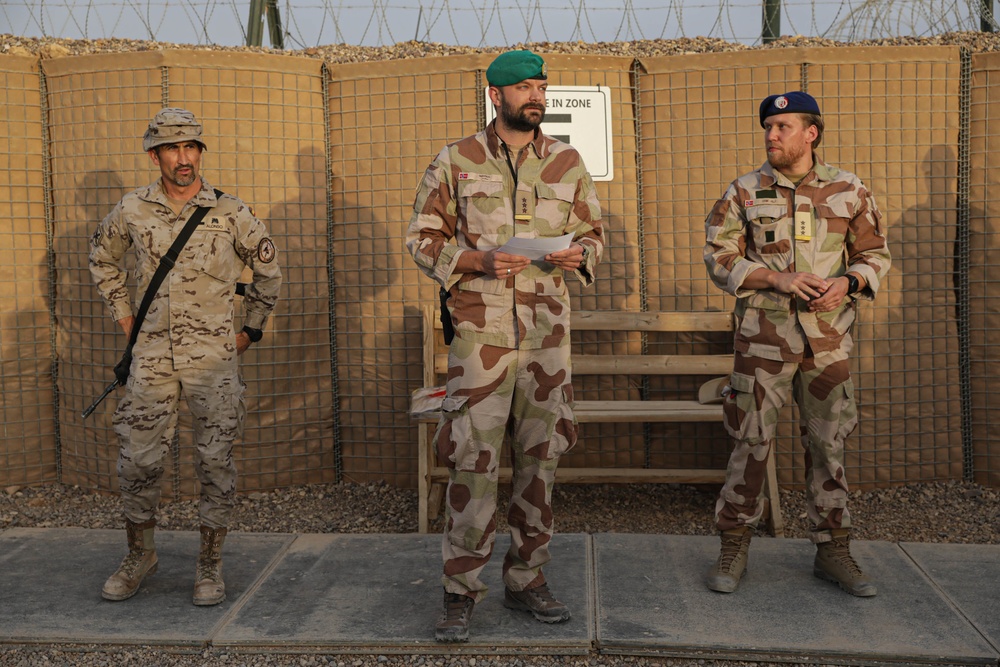 U.S. Soldiers and Coalition partners conduct Norwegian Ruck March at Al Asad Air Base, Iraq