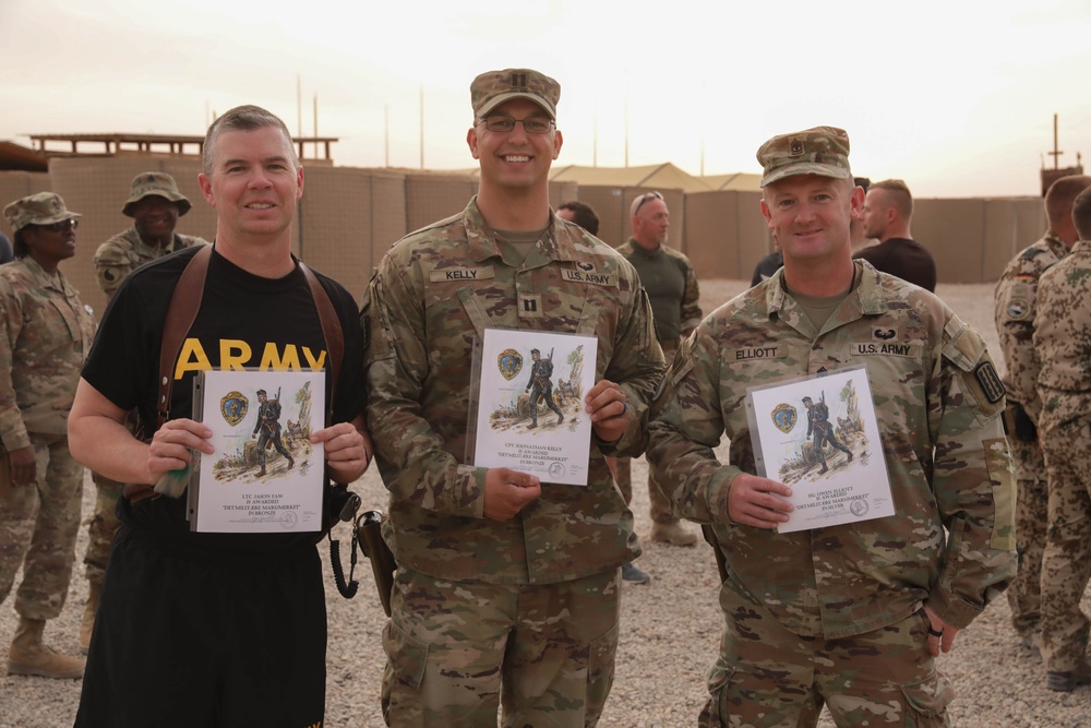 U.S. Soldiers and Coalition partners conduct Norwegian Ruck March at Al Asad Air Base, Iraq