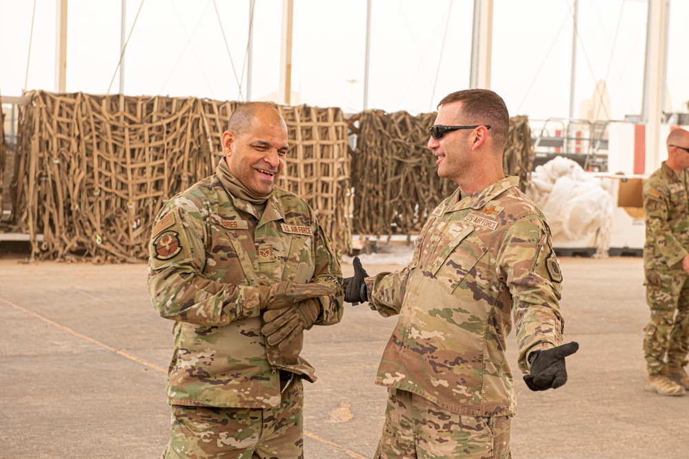 Roll Sleeves Up - 378th AEW leadership help out at Aerial Port