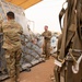 Roll Sleeves Up - 378th AEW leadership help out at Aerial Port