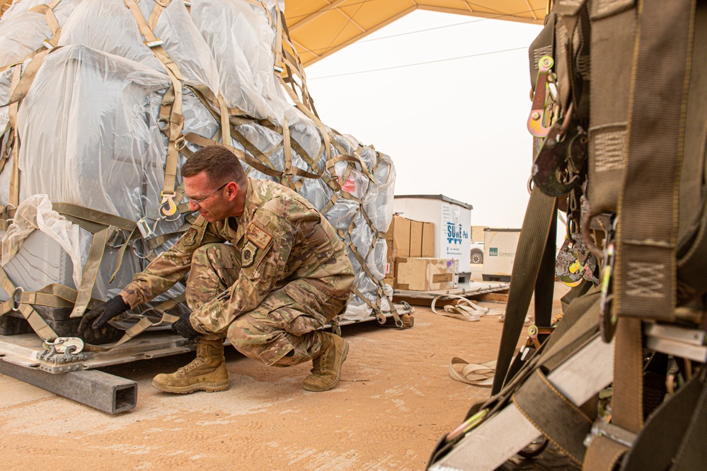 Roll Sleeves Up - 378th AEW leadership help out at Aerial Port