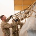 Roll Sleeves Up - 378th AEW leadership help out at Aerial Port