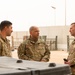 Roll Sleeves Up - 378th AEW leadership help out at Aerial Port