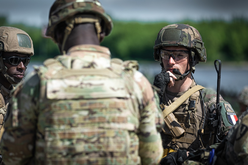 US, NATO Allies Work Together to Breach the Obstacle