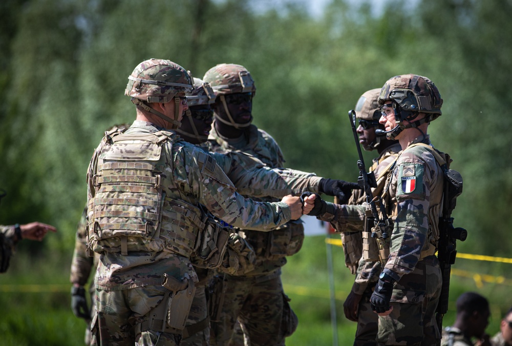 US, NATO Allies Work Together to Breach the Obstacle